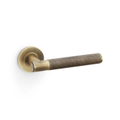 Spitfire Lever on Round Rose Knurled Style Antique Brass