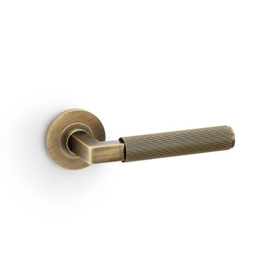 Hurricane Lever on Round Rose Reeded Style Antique Brass
