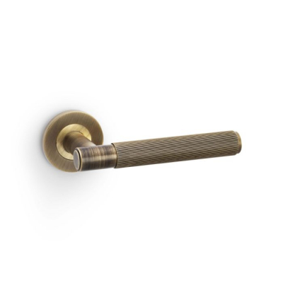 Spitfire Lever on Round Rose Reeded Style Antique Brass